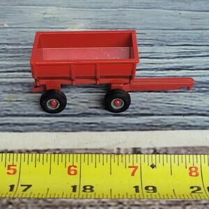 Ertl 1/64 scale die-cast IH  flare side trailer red/gray
